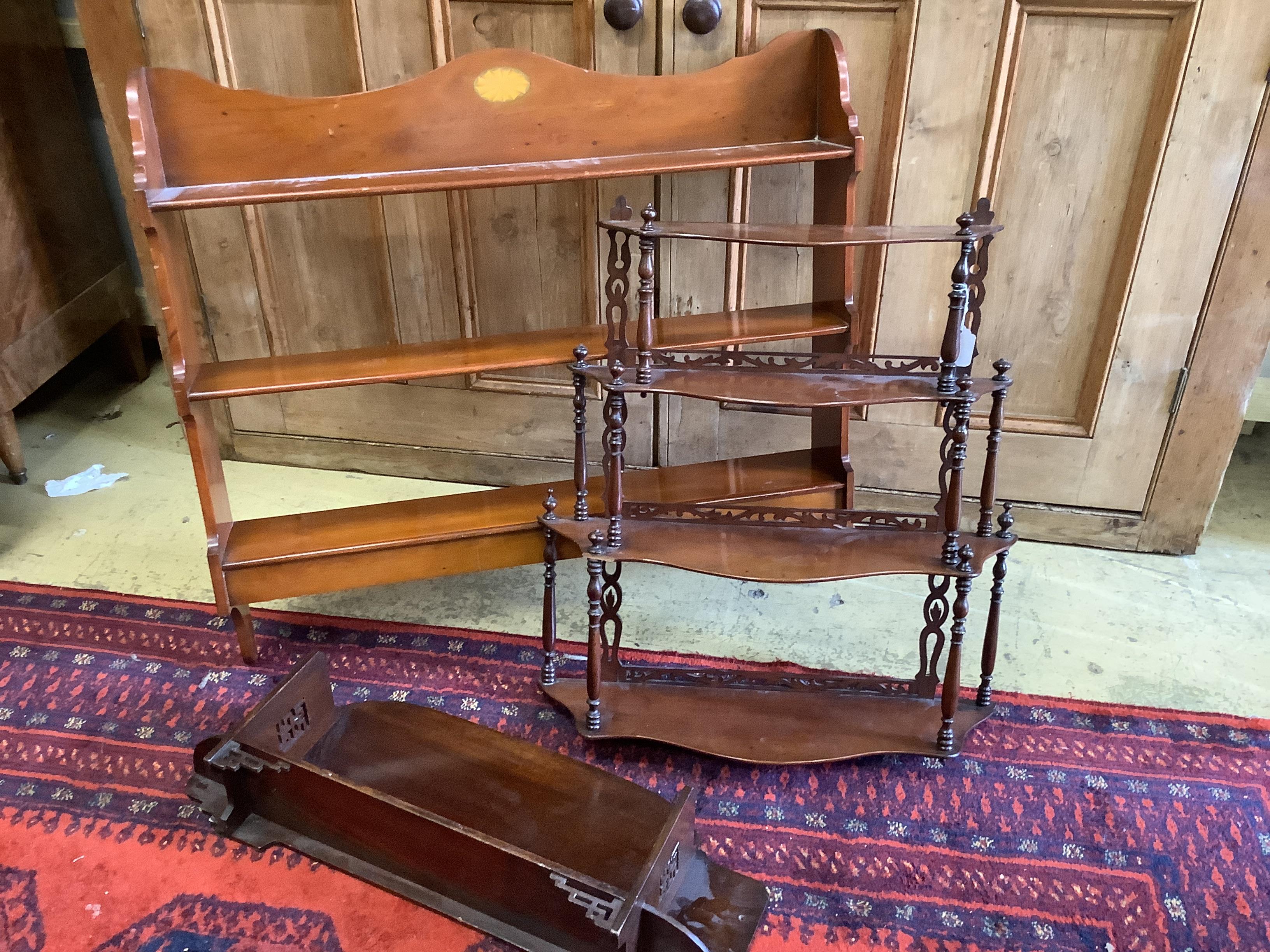 A Victorian mahogany serpentine four tier wall bracket, an Edwardian style inlaid yew wall bracket and a Chinese wall shelf, largest width 91cm.